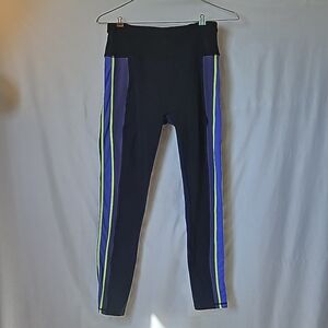 Motion 365 fabletic pants black with purple and yellow stripes on the sides